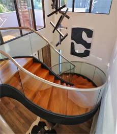 Interior modern design carbon steel white oak treads curved staircase 