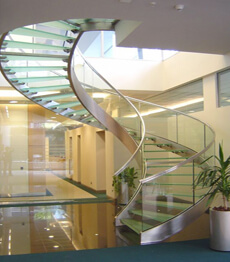 Unique mirror stainless steel frame glass treads curved stairs staircase 